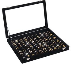 an open black box filled with lots of rings