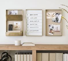 a shelf with some books and pictures hanging on it's wall next to a bookcase