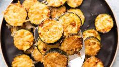 cooked zucchini on a plate with a napkin