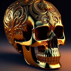 a golden skull with ornate designs on it