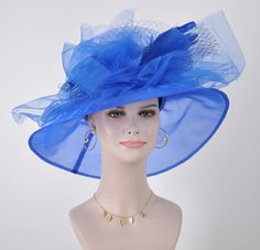 "How to take the custom order: 1. Show me the style of hat or fascinator you like from my store and a photo of your outfit and any other details you'd like me to know 2. I will send you a photo of the materials we have selected to be used for your hat and tell you the fee you need to pay, then give you a special link to purchase it, once completed, before I ship you the hat, I will show you the custom hat. The hat can be picked up in Rockville, Maryland. 3. Please keep in mind that no two hats a Blue Costume Hat For Church, Blue Hat For Royal Ascot Event, Blue Hats For Kentucky Derby Event, Blue Cloche Hat For Evening, Blue Brimmed Mini Hats For Party, Blue Cloche Hat For Party, Blue Brimmed Fascinator For Church, Blue Brimmed Fascinator For Wedding