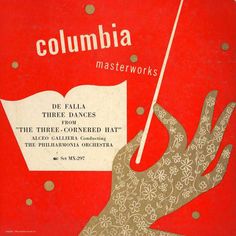 an advertisement for the columbia music company, featuring a hand holding a white umbrella with gold dots on it