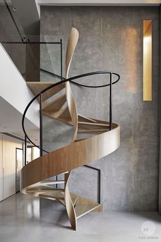 a spiral staircase in the middle of a room