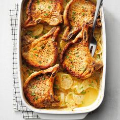 a casserole dish filled with chicken and potatoes