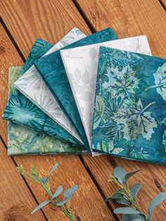 fabric fat quarters Gift Bag Organization, Serene Forest, Paper Crafts Magazine, Fabric Outlet, Needlework Shops, Fat Quarter Quilt, Hoffman Fabrics, Beginner Knitting Patterns, Leaf Designs