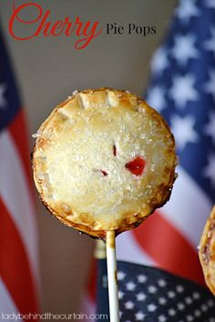 cherry pie pops on a stick with american flags in the background