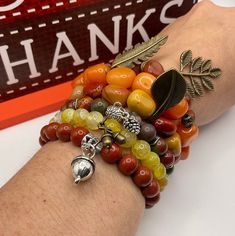 "These Fall/Autumn theme Stretchy bracelets are handcrafted personally for me, Derlis. You can buy these bracelets as a set of 6 different stretch bracelets or buy them individually. Also, you can pick your size bracelet. A wonderful gift to your friends, family or love ones, or to wear at Thanksgiving dinner, family reunion. It is very important that you measure your wrist before placing your order to find your correct size bracelet. You can use a flexible tape measure, or a piece of paper, or Dinner Family, Autumn Jewelry, Autumn Bracelet, Craft Corner, Fall Clothes, Square Bead, Fall Jewelry, Stretchy Bracelets, Leaf Charms