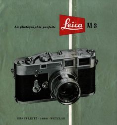 an advertisement for leica m3 camera on green paper with red ribbon attached to it