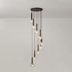 a chandelier with eight lights hanging from the ceiling