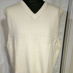 Tommy Hilfiger Men's Sweater Vest. Ivory Color. Size L. V-Neck, Sleeveless. Great For Layering. Nwot Classic White Sweater Vest For Winter, Classic White Vest For Fall, White Fitted Classic Sweater Vest, Classic White Sleeveless Sweater Vest, Classic White V-neck Sweater Vest, Men's Sweater Vest, Classic Beige V-neck Vest, Fitted Cream V-neck Sweater Vest, Cheap Multicolor V-neck Sweater Vest