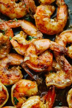 cooked shrimp with garlic and parsley in a skillet, ready to be served