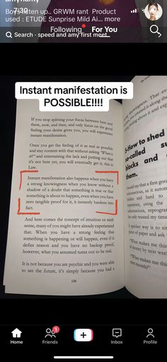 an open book with the text instant manifiction is possible on it and there are two red arrows pointing up