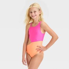 Give your darling an on-trend look with the Solid One-Piece Swimsuit from Cat & Jack™. This two-tone swimsuit features an asymmetrical design with a side cutout. Made from soft and stretchy fabric with full lining and elastic at the leg openings, this swimsuit offers comfort all through their activities. Plus, with the UPF 50+ rating, this full-coverage swimsuit helps keep their skin shielded from the sun's rays. Cat & Jack™: Designed for all children so you can trust it's made for yours. Coverage Swimsuit, Full Coverage Swimsuit, Wave Print, Red Turquoise, Swimsuit Shops, Kids Outfits Girls, Asymmetrical Design, Pair Of Pants