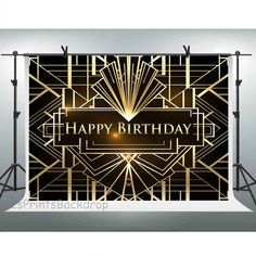 a black and gold birthday party backdrop with the words happy birthday in front of it