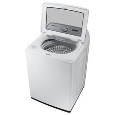 a white washer sitting on top of a dryer