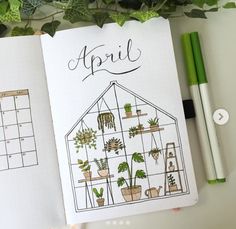 an open notebook with plants and calendars on it