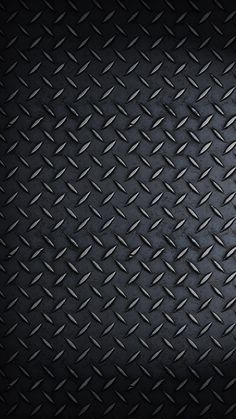 an abstract black diamond plate background with room for your text or image in the center