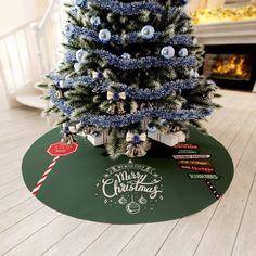 a small christmas tree on top of a green mat