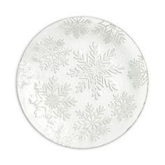 a white plate with snowflakes on it