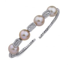 This 18K White Gold Diamond Pearl Bracelet features a bangle style with Diamonds and a round pearl, expertly crafted with 18K white gold and designed to sparkle and shine with elegance and sophistication. Pearl Bangle Bracelet, Fine Pearl Jewelry, Designers Jewelry Collection, Diamond Bracelet Design, Pearl Bangle, Bangles Style, Sparkle And Shine, Diamond Bracelets, Gold Jewelry Fashion