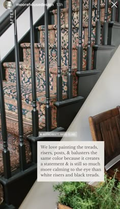 an image of stairs and rugs on the floor in front of a stair case