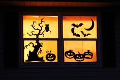 the window is decorated with halloween decorations