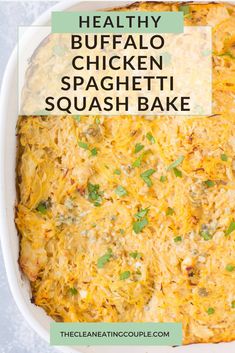 healthy buffalo chicken spaghetti squash bake in a white casserole dish with text overlay