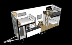 the tiny house is built on wheels and has a loft bed, desk, and kitchenette