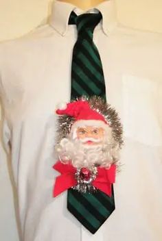 a man wearing a tie with a santa clause on it