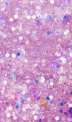 an abstract purple background with white and blue speckles