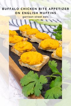 buffalo chicken bite appetizer on english muffins with garnishes