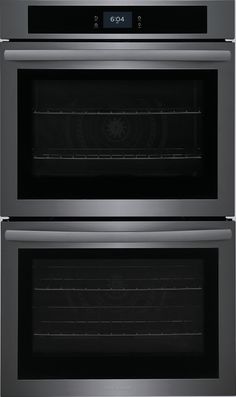 two double ovens side by side with the door open and one on each side