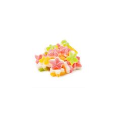 a pile of gummy bears sitting on top of a white table