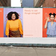 two women standing next to each other in front of a sign that says ready to set things straight?