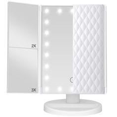 the lighted vanity mirror is shown with its lights on and it's light up