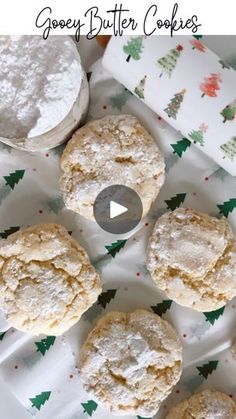 cookies and powdered sugar on a plate with the words gooey butter cookies over it