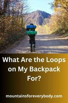 a person walking down a dirt road with backpacks on their back and the words, what are the loops on my backpack for?