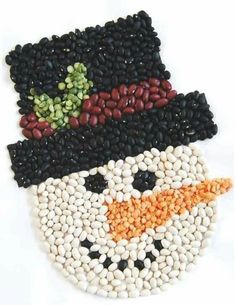 an image of a face made out of beans