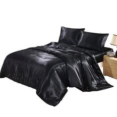 Portrait of a picture displaying Satin Bedding Set product. Black Duvet, Silk Duvet Cover, Silk Comforter, Black Duvet Cover, Silk Bedding Set, Satin Bedding, Comforter Bedding Sets, Queen Size Quilt, Silk Bedding