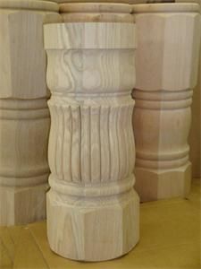 three wooden vases sitting next to each other on top of a table in a room