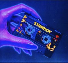 someone is holding an old school tape recorder in their hand, with the word starboy on it