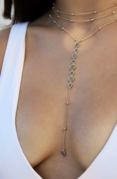 Glittering cubic zirconia stones catch the light on a multichain necklace in 18-karat gold plate. 15" longest strand length; 12 1/2" shortest strand length5" extender 6" pendant drop, 1/4" width Lobster clasp closure 18k-gold plate/cubic zirconia Imported Dope Jewelry, Jewelry Lookbook, Body Chain Jewelry, Girly Jewelry, Jewelry Inspo, Dream Jewelry, Lariat Necklace, Pretty Jewellery, Piercing Jewelry