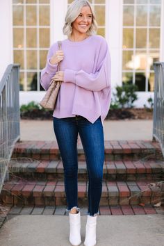 This oversized sweater is giving us all of the fall vibes! It's just so cozy and comfy! We think this is the perfect sweater for running errands, lounging around, or just any day of the week you want to be ultra comfy while still looking cute! Round neckline Long dolman sleeves Split hem on sides Cozy knit fabric Oversized fit Generous stretch Payton is wearing the small. Lilac Sweatshirt Outfit, Purple Sweater Outfit, Lavender Sweater, Sweater Outfits Fall, Perfect Sweater, Dolman Sweater, Sweater Outfit, Fall Clothes, Sweatshirt Outfit