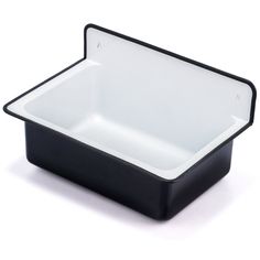 a black and white square dish on a white background with the lid off to the side