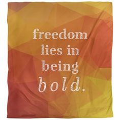 an orange and yellow blanket with the words,'freedom lies in being bold '