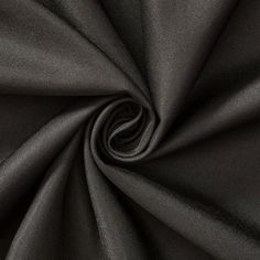 black fabric with a spiral design on it