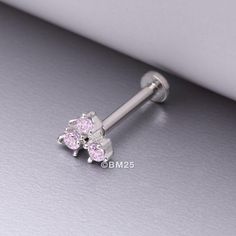 Introducing a sparkly start to your accessory collection: the Trinity Sparkle Prong Set Top Internally Threaded Steel Flat Back Stud Labret! Perfect for cartilage, nose, lobes and other piercings, this hot accessory will give your look a glorious glow. * Material: 316L Stainless Steel * Available in 16 Gauge (1.2mm) and in 2 bar lengths, 6mm & 8mm * Gem top measures 5mm * Internally Threaded Suitable for * Ear Piercings (Cartilage, Helix, Tragus) * Lip Piercings (Dahlia, Jestrum, Snake Bites, Ve Piercings Cheek, Piercings Facial, Vertical Labret, Piercings Cartilage, Lip Piercings, Gem Top, Ear Piercings Cartilage, Facial Piercings, Snake Bites