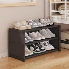 there are many pairs of shoes on the shelf