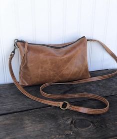 Only ONE available Distressed Tan Leather Convertible | Etsy Brown Everyday Crossbody Phone Bag, Brown Crossbody Phone Bag For Everyday, Brown Crossbody Wallet, On-the-go Brown Crossbody Wallet, Brown Crossbody Wallet For On-the-go, Everyday Phone Bag With Cell Phone Pocket, Chic Crossbody Wallet For Everyday Use, Daily Use Crossbody Clutch With Cell Phone Pocket, Brown Clutch Phone Bag For Everyday Use