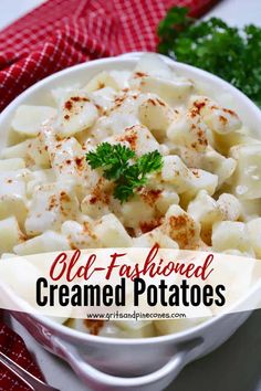 old fashioned creamed potatoes in a white bowl with parsley